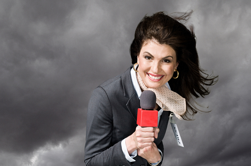 News presenter in storm