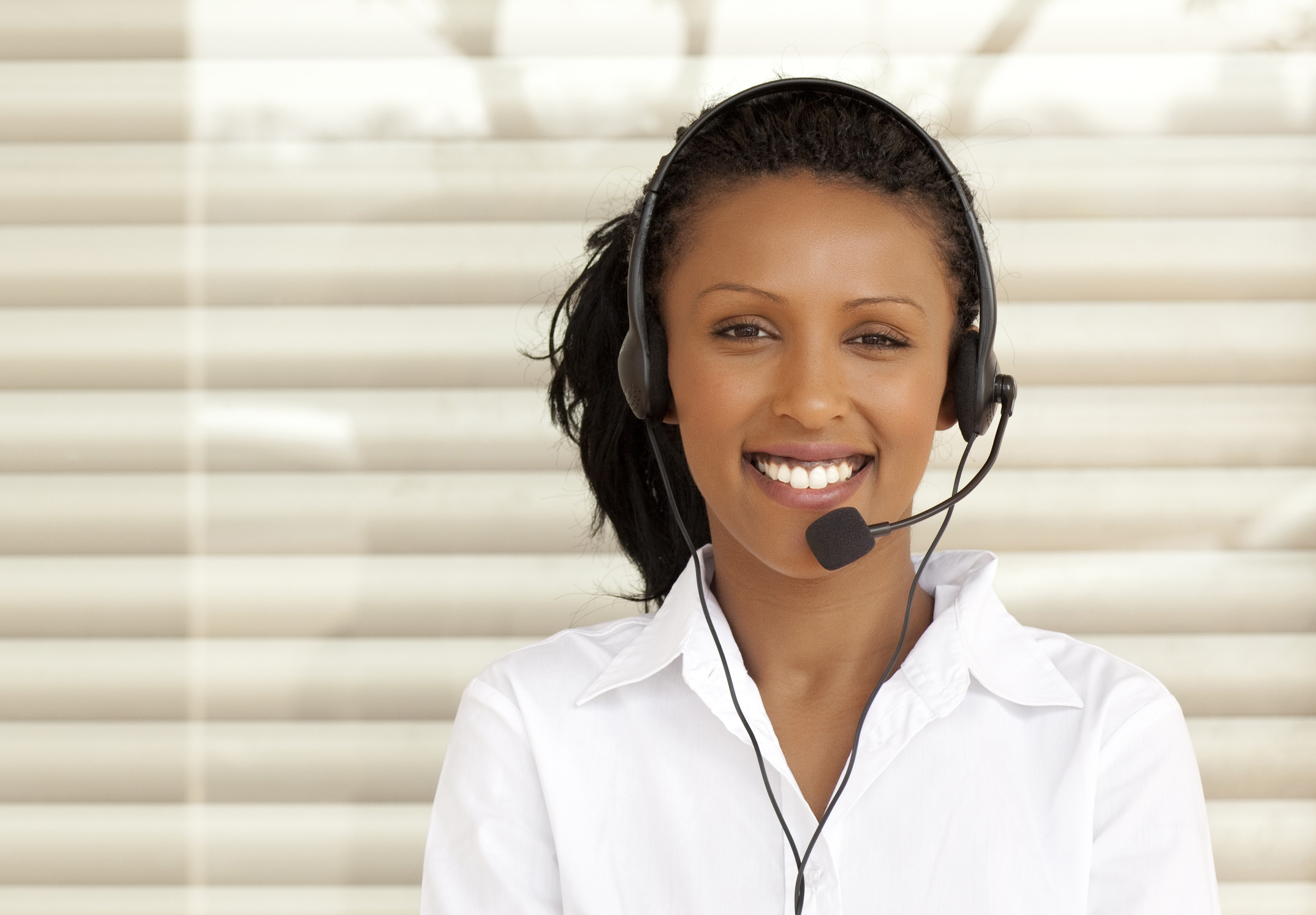 Woman operator on office window background. Large copy space for your content. Similar images preview: