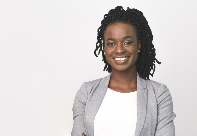 African American Business Lady Pointing Finger At Copyspace On White Background In Studio. Isolated, Panorama