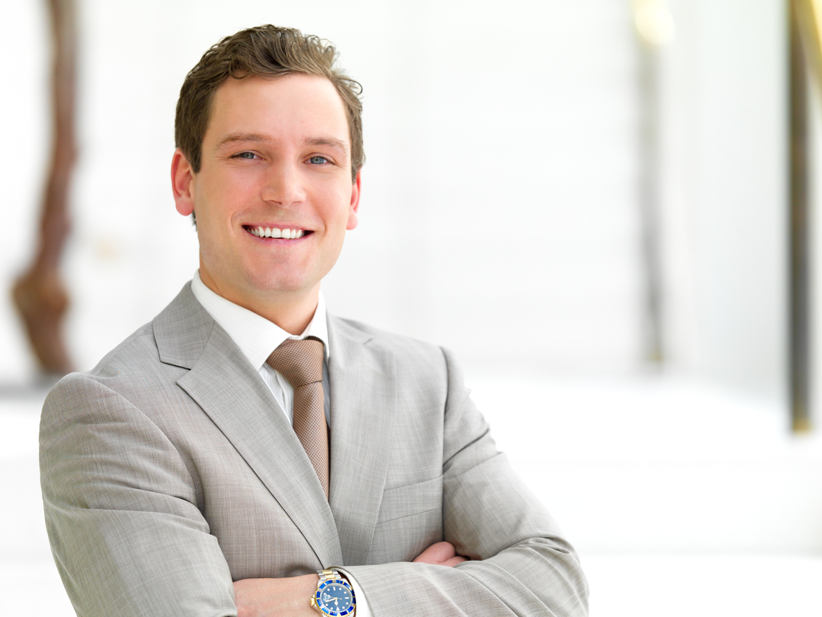 Handsome businessman smiling